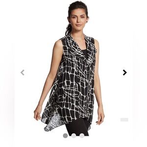 Chico’s black and white vest. Chic animal print with an off-center zipper.